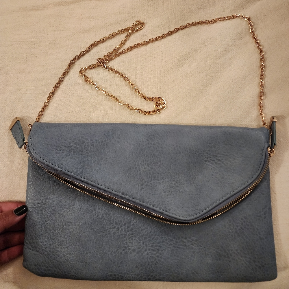 Blue with black and white stripes fold over purse